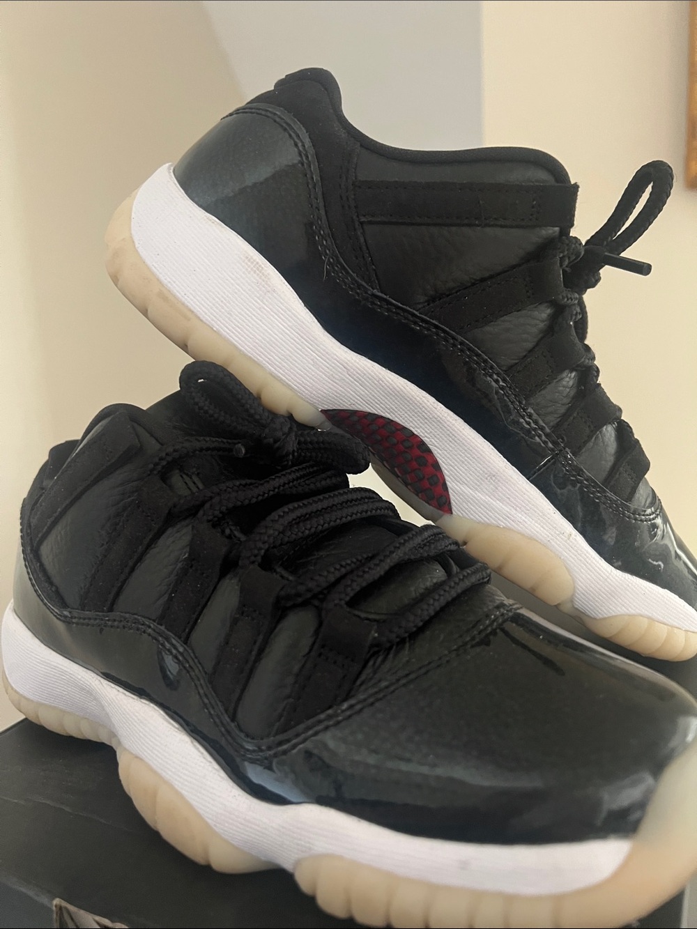 Jordan 11 Black, White & Cream Low-Top